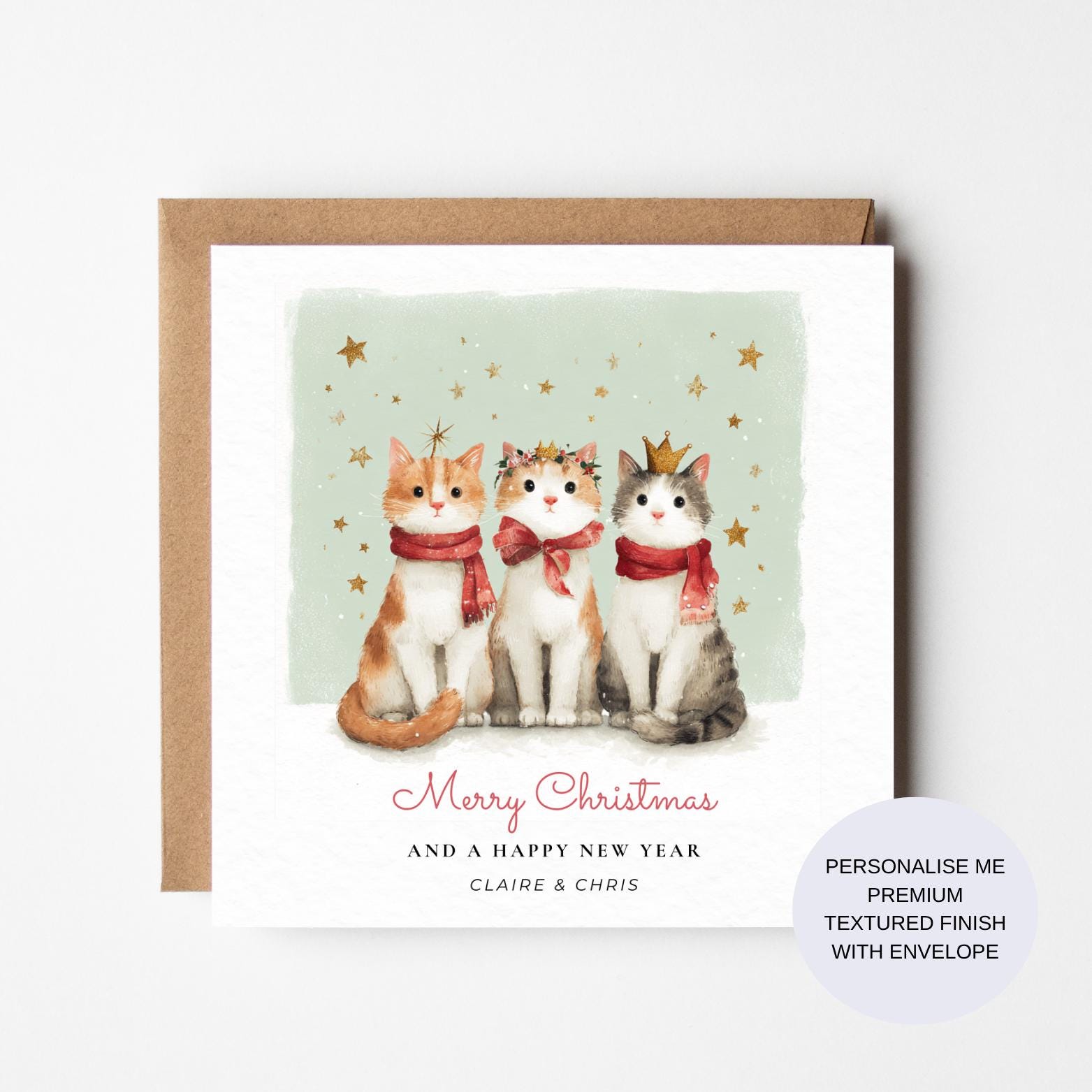 Three Cats Christmas Card: Festive Scarves and Crowns Design