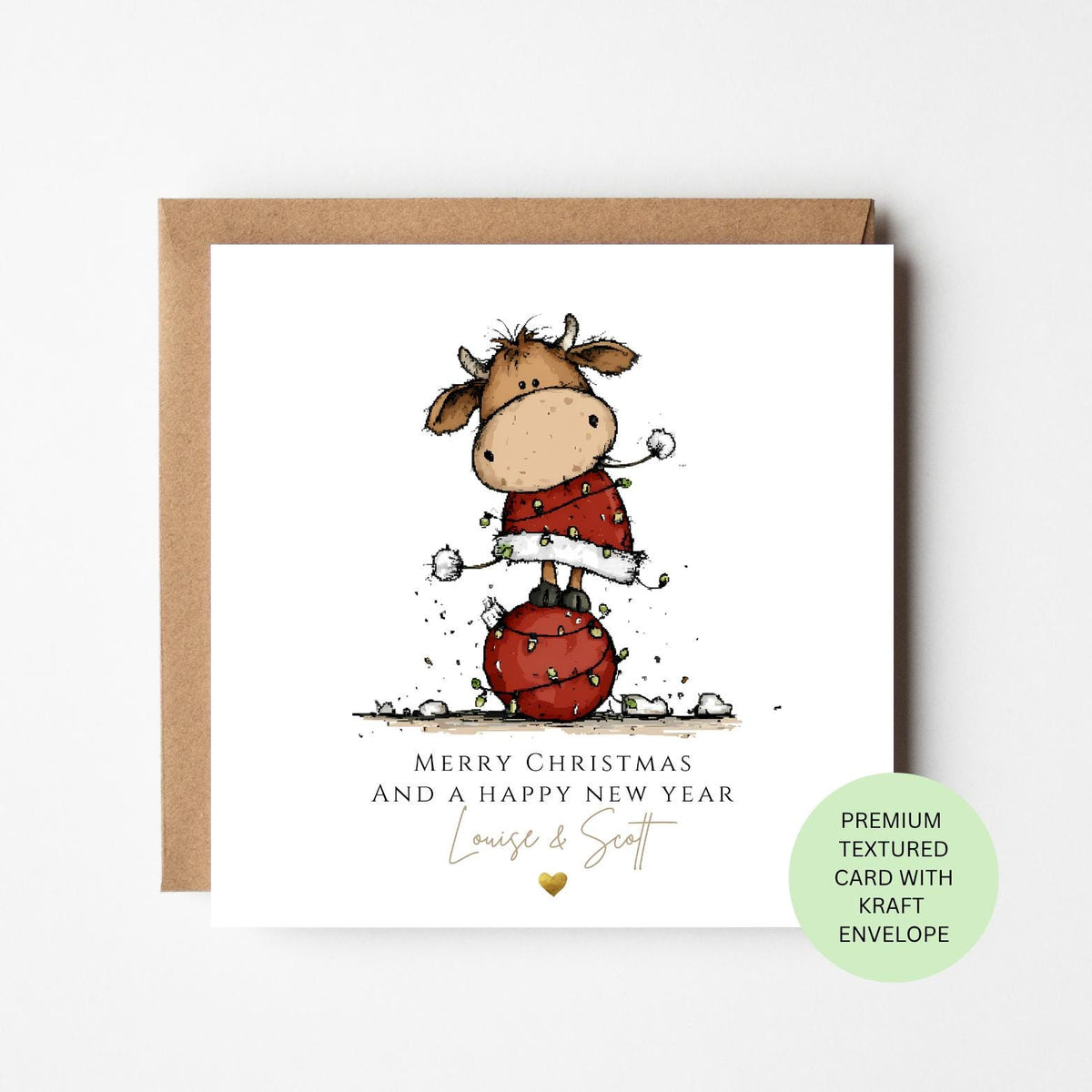 Personalised Cow Balancing on a Christmas Bauble Card