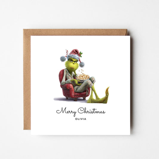 Personalised Grinch Christmas Card – Funny Grinch Watching TV – Custom Name Xmas Card – Humorous Holiday Greeting