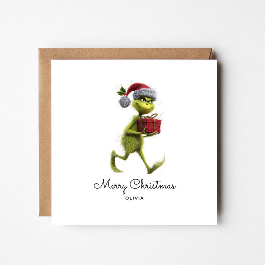 Personalised Grinch Christmas Card – Funny Grinch with Gift – Custom Name Xmas Card – Humorous Holiday Greeting