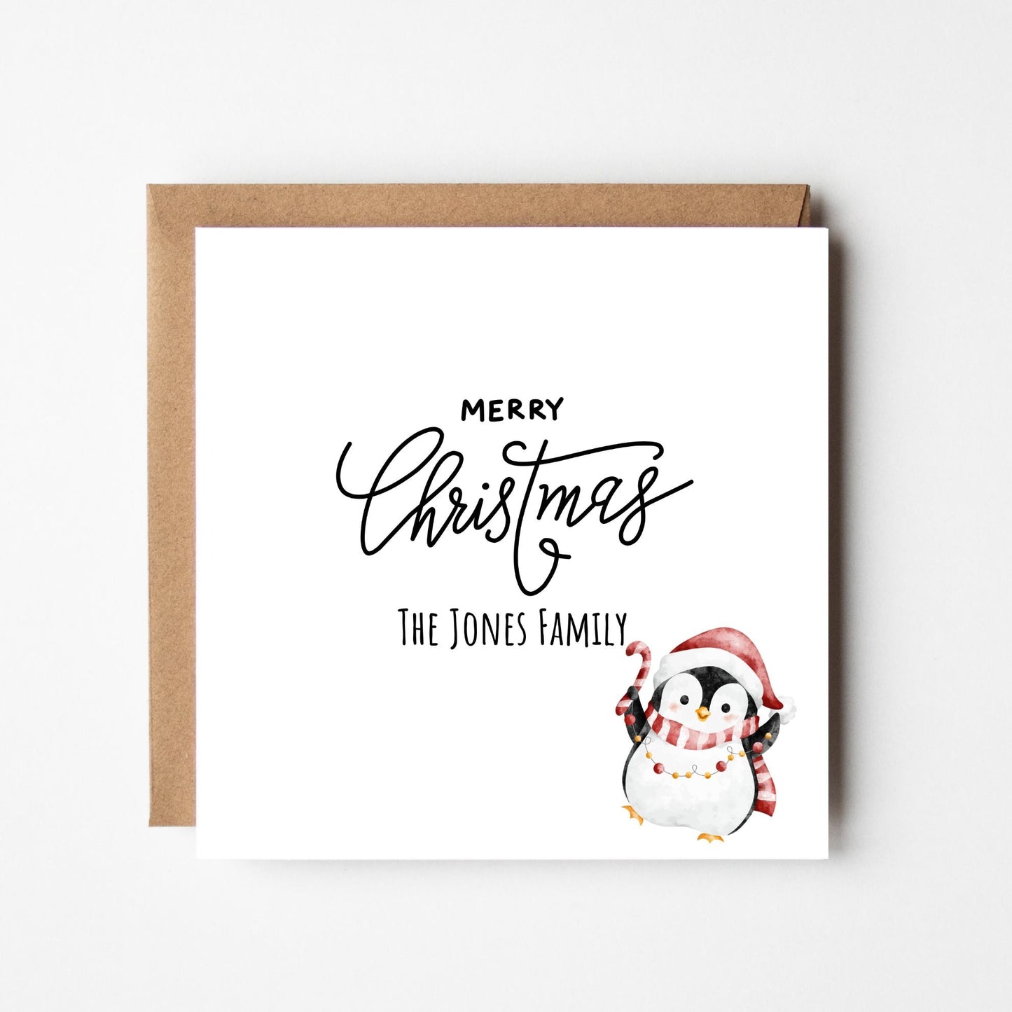 Personalised Penguin Christmas Card: Custom Family Name Holiday Greeting