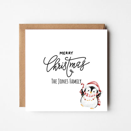 Personalised Penguin Christmas Card: Custom Family Name Holiday Greeting