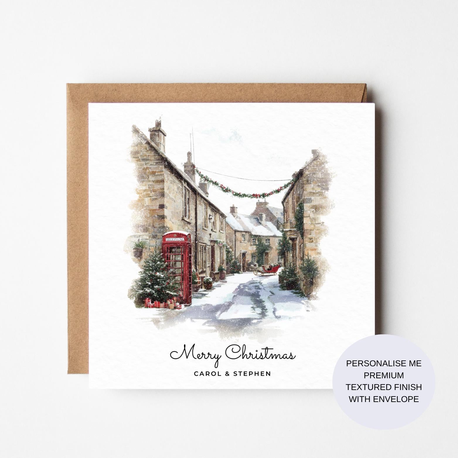 Cotswold Christmas Card - Snowy Village Street with Red Phone Box